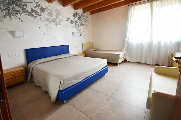 Imagen de la habitación del Agriturismo Corte Tonolli. Foto 19