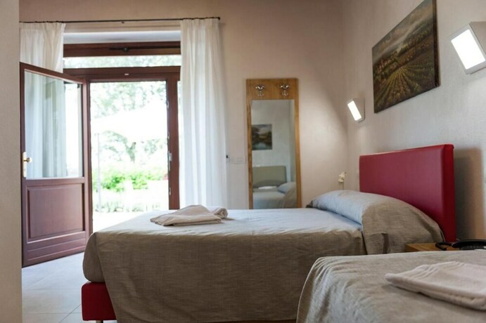Imagen de la habitación del Agriturismo Corte Tonolli. Foto 28