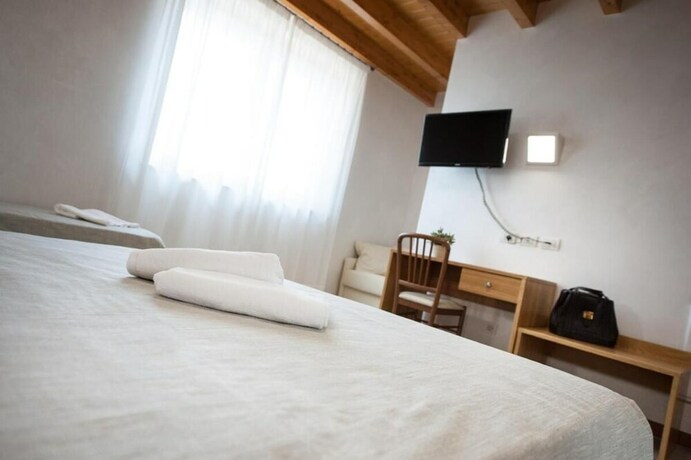 Imagen de la habitación del Agriturismo Corte Tonolli. Foto 35