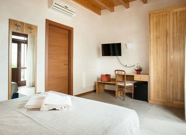 Imagen de la habitación del Agriturismo Corte Tonolli. Foto 37