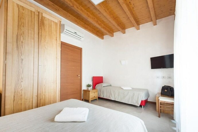 Imagen de la habitación del Agriturismo Corte Tonolli. Foto 38