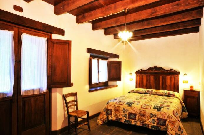 Imagen de la habitación del Agriturismo Del Cimone - La Palazza. Foto 14