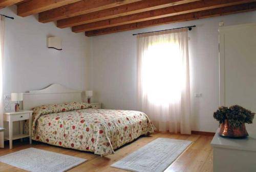 Imagen de la habitación del Agriturismo Di La' Dal Fiume. Foto 11