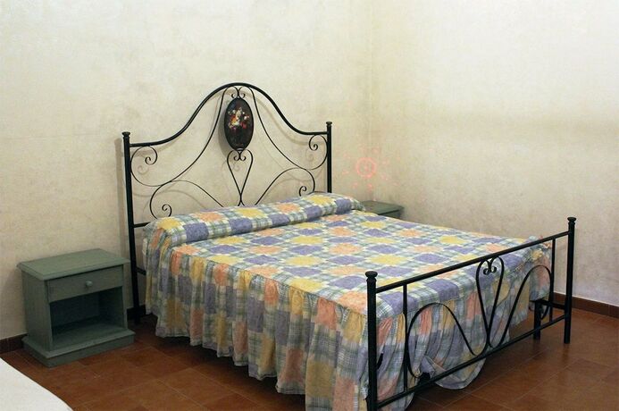 Imagen de la habitación del Agriturismo Fara Del Falco. Foto 20