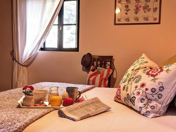 Imagen de la habitación del Agriturismo Fattoria La Prugnola. Foto 20