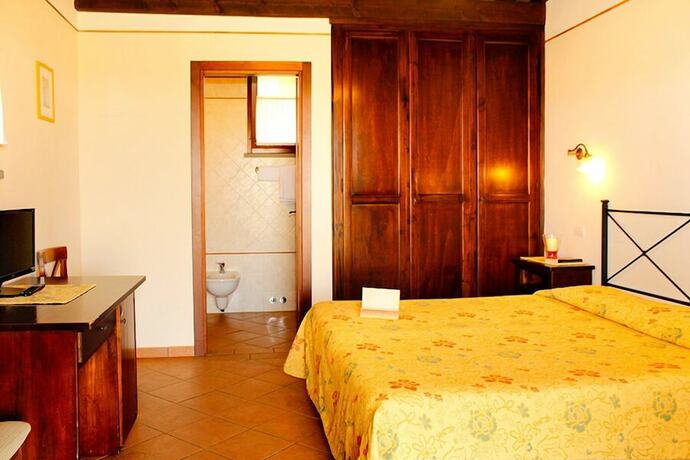 Imagen de la habitación del Agriturismo Giuncola e Granaiolo. Foto 18