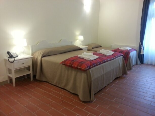 Imagen de la habitación del Agriturismo Il Frantoio di Colle Alberto. Foto 14