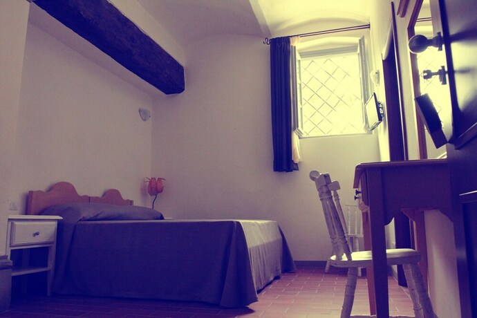 Imagen de la habitación del Agriturismo Il Frantoio di Colle Alberto. Foto 16