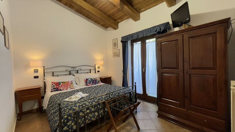 Imagen de la habitación del Agriturismo La Casa del Ghiro. Foto 19