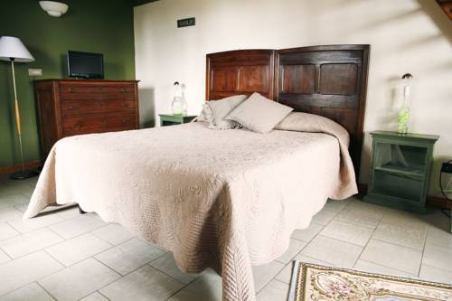 Imagen de la habitación del Agriturismo La Margherita - Golf Girasoli. Foto 4