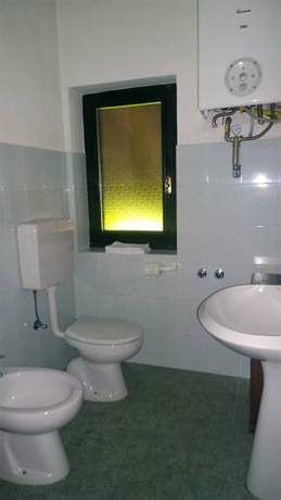 Imagen de la habitación del Agriturismo La Margherita - Golf Girasoli. Foto 8