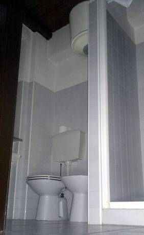 Imagen de la habitación del Agriturismo La Margherita - Golf Girasoli. Foto 14