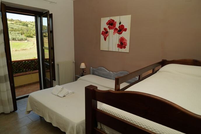 Imagen de la habitación del Agriturismo La Petrosa. Foto 13