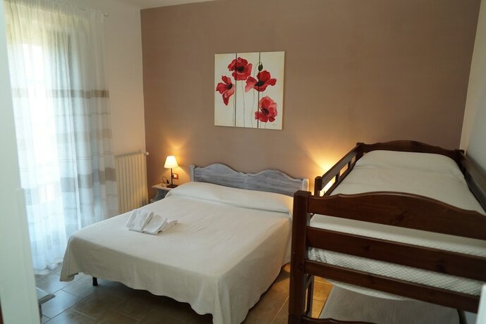 Imagen de la habitación del Agriturismo La Petrosa. Foto 15