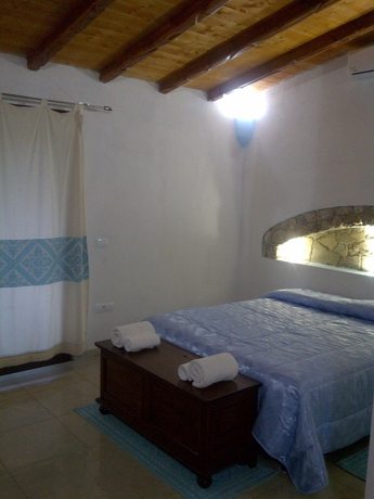 Imagen de la habitación del Agriturismo La Quercia, Arbus. Foto 6