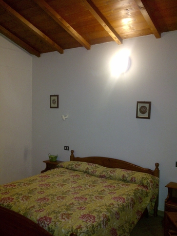 Imagen de la habitación del Agriturismo La Quercia, Arbus. Foto 8