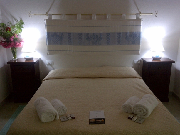 Imagen de la habitación del Agriturismo La Quercia, Arbus. Foto 9