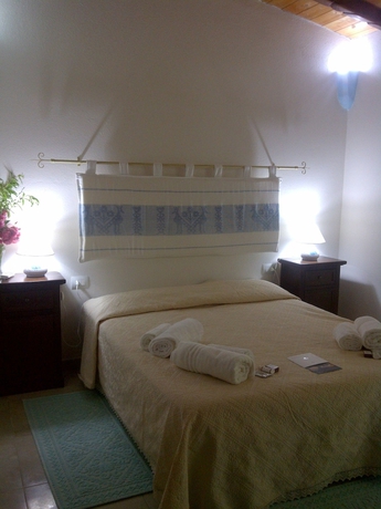 Imagen de la habitación del Agriturismo La Quercia, Arbus. Foto 13
