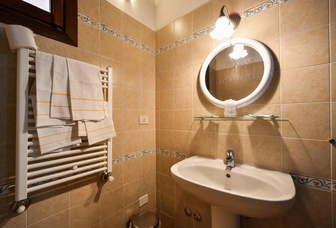 Imagen de la habitación del Agriturismo La Valle Dei Bronzetti. Foto 3