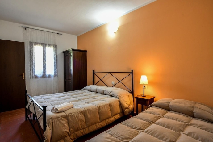 Imagen de la habitación del Agriturismo La Valle Dei Bronzetti. Foto 10