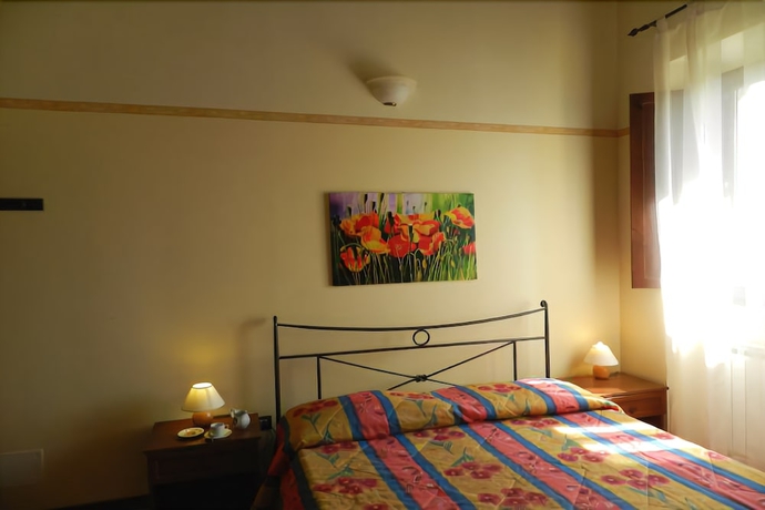 Imagen de la habitación del Agriturismo L'olmo Di Casigliano. Foto 11