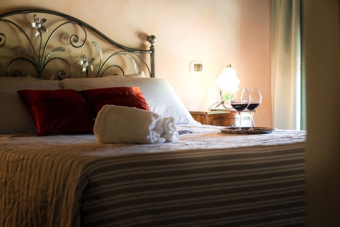 Imagen de la habitación del Agriturismo Millefiori Corte delle Rose. Foto 3