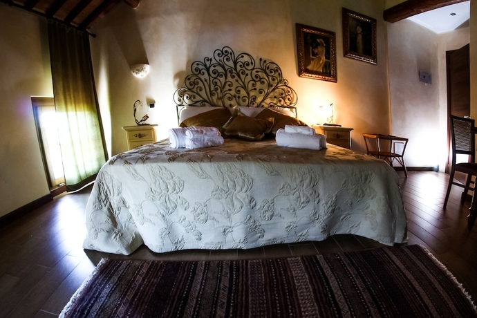 Imagen de la habitación del Agriturismo Millefiori Corte delle Rose. Foto 4
