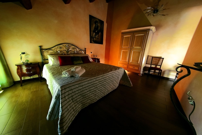 Imagen de la habitación del Agriturismo Millefiori Corte delle Rose. Foto 5