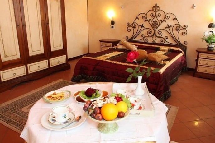 Imagen de la habitación del Agriturismo Millefiori Corte delle Rose. Foto 8