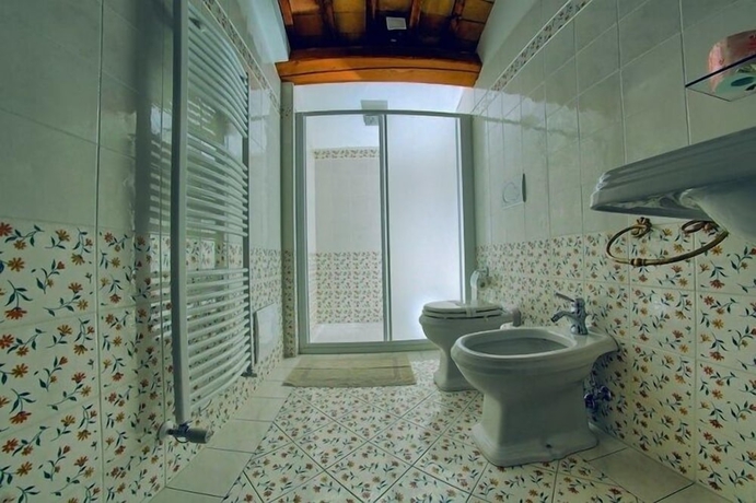 Imagen de la habitación del Agriturismo Millefiori Corte delle Rose. Foto 12