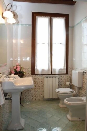 Imagen de la habitación del Agriturismo Millefiori Corte delle Rose. Foto 13