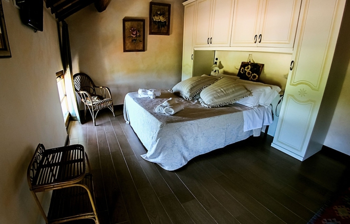 Imagen de la habitación del Agriturismo Millefiori Corte delle Rose. Foto 15