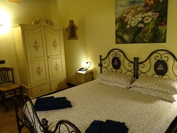 Imagen de la habitación del Agriturismo Olivastrella. Foto 19