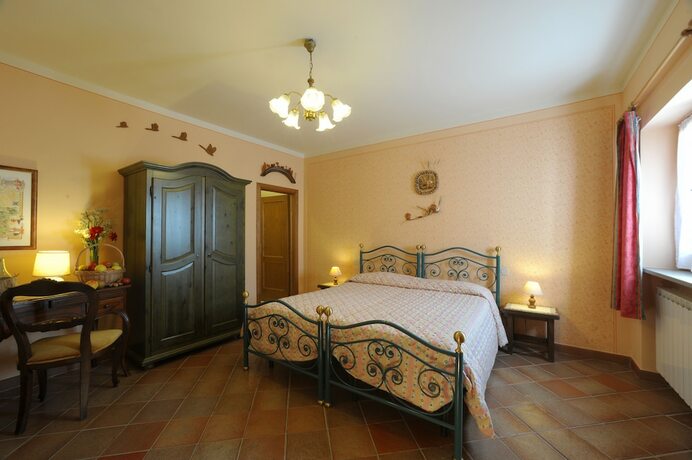 Imagen de la habitación del Agriturismo Podere Poggio Ai Cieli. Foto 12
