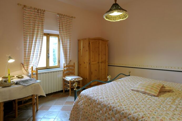 Imagen de la habitación del Agriturismo Podere Poggio Ai Cieli. Foto 15
