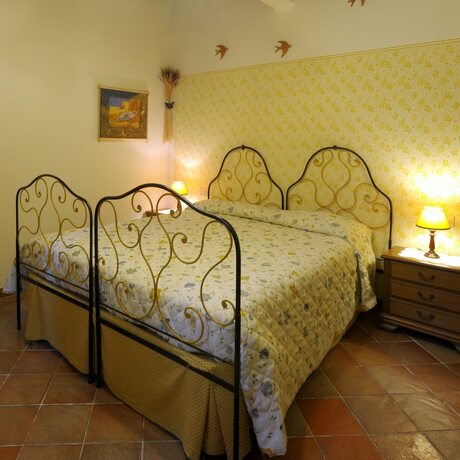 Imagen de la habitación del Agriturismo Podere Poggio Ai Cieli. Foto 17
