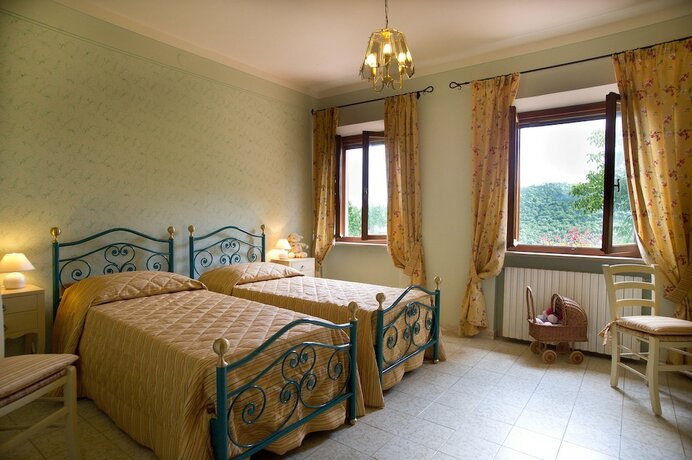 Imagen de la habitación del Agriturismo Podere Poggio Ai Cieli. Foto 19