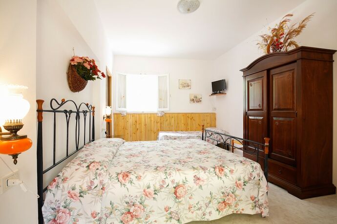 Imagen de la habitación del Agriturismo Posta Pastorella. Foto 13