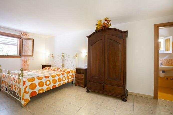 Imagen de la habitación del Agriturismo Posta Pastorella. Foto 14