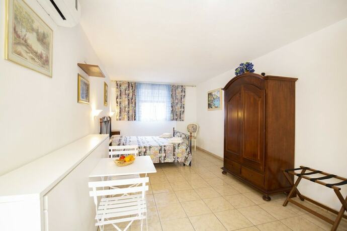 Imagen de la habitación del Agriturismo Posta Pastorella. Foto 16