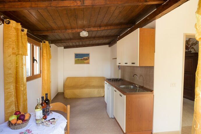 Imagen de la habitación del Agriturismo Posta Pastorella. Foto 18