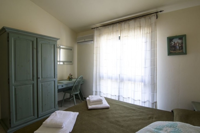 Imagen de la habitación del Agriturismo Sa Rocca. Foto 7