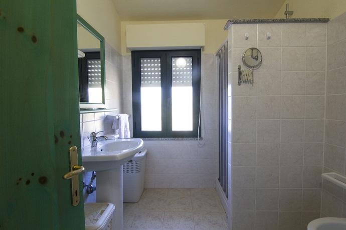 Imagen de la habitación del Agriturismo Sa Rocca. Foto 14