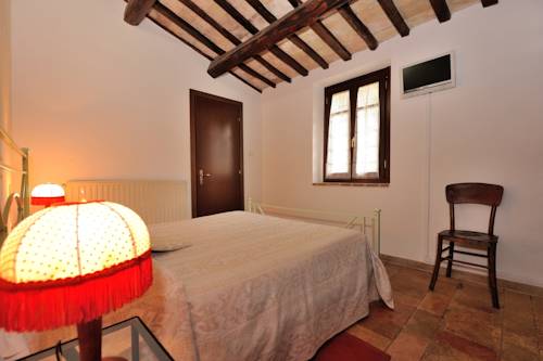 Imagen de la habitación del Agriturismo Sasso Rosso. Foto 12