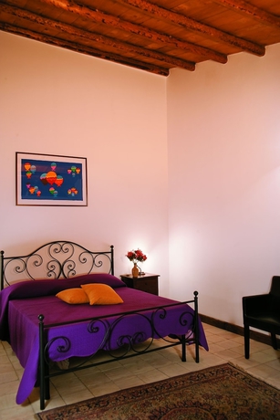 Imagen de la habitación del Agriturismo Sirignano Wine Resort. Foto 2