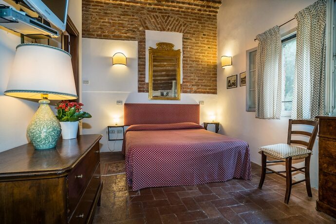 Imagen de la habitación del Agriturismo Tenuta Castel Venezze. Foto 12