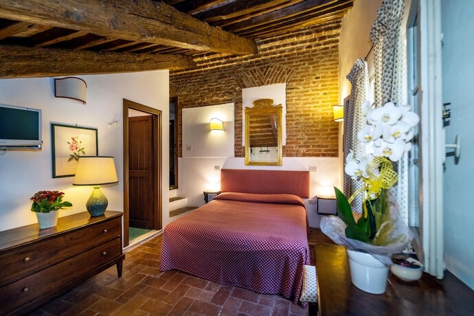 Imagen de la habitación del Agriturismo Tenuta Castel Venezze. Foto 16