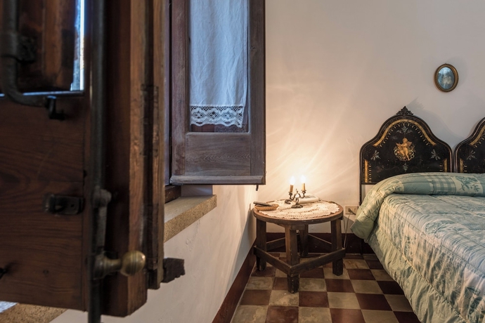 Imagen de la habitación del Agriturismo Tenuta Pizzolungo. Foto 11