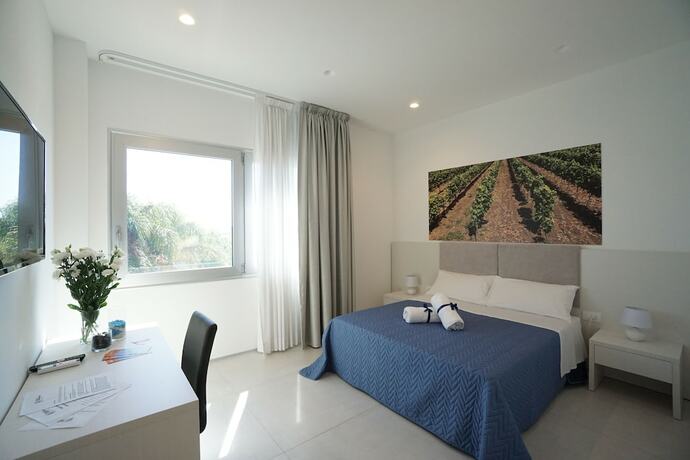 Imagen de la habitación del Agriturismo Terra di Negroamaro. Foto 13