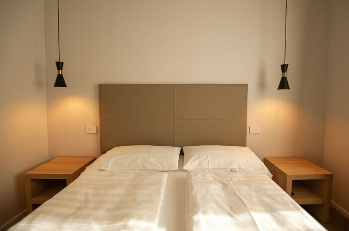 Imagen de la habitación del Ah Porticcioli boutique apartments. Foto 14